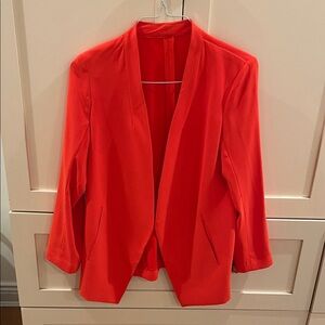 Woman’s Orange Blazer